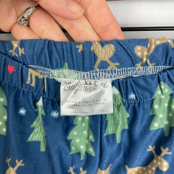 Sugar Bee Boutique | Christmas Tree & Reindeer Print Mommy Ruffle Pajama Set - Picture 13 of 13